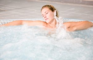 girl relaxing in a hot tub